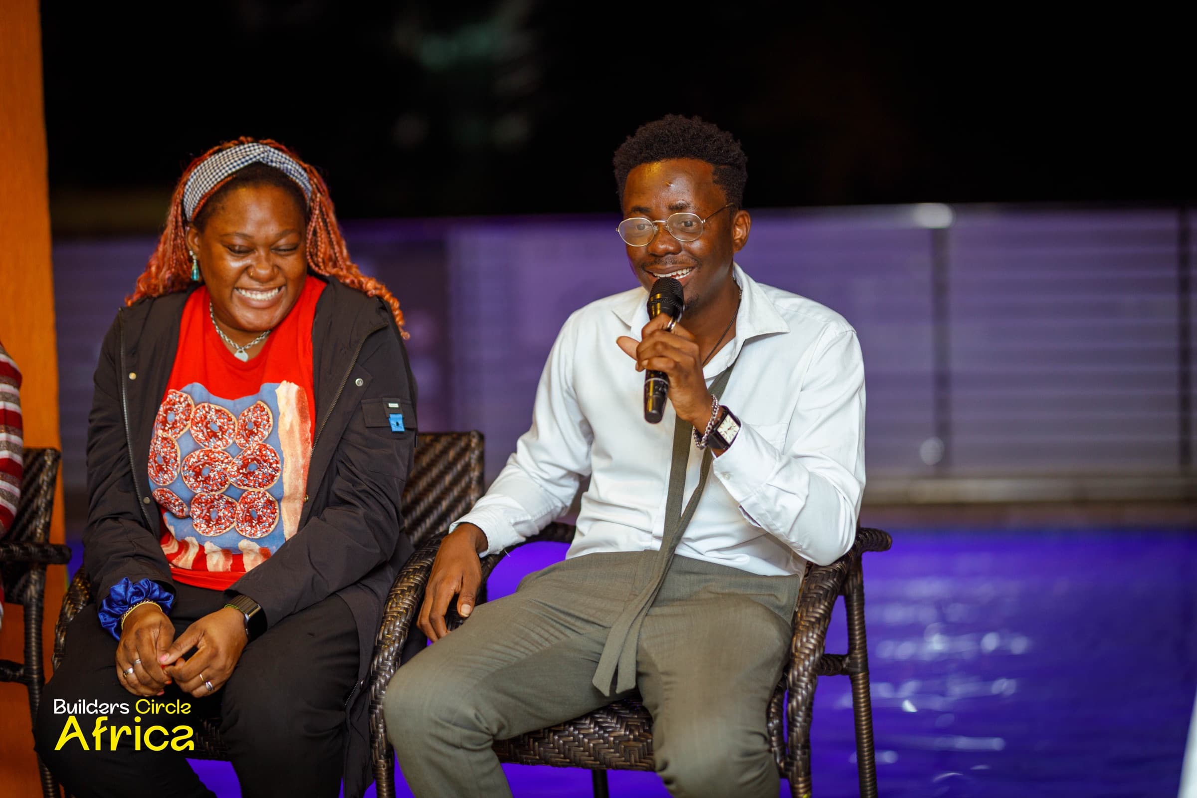 A seated conversation on stage