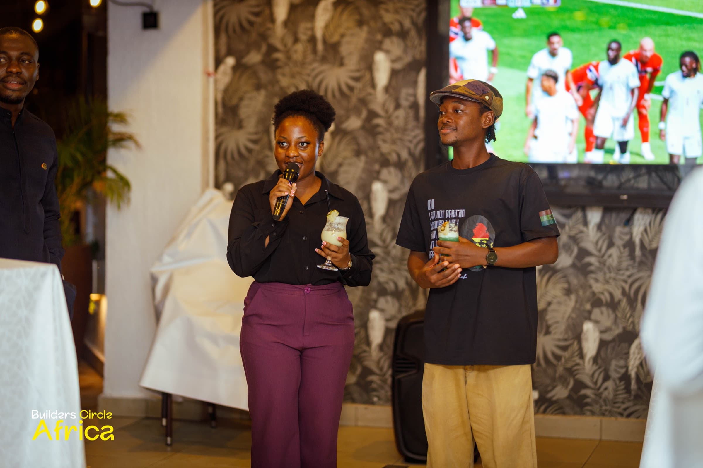 Two guests taking the mic