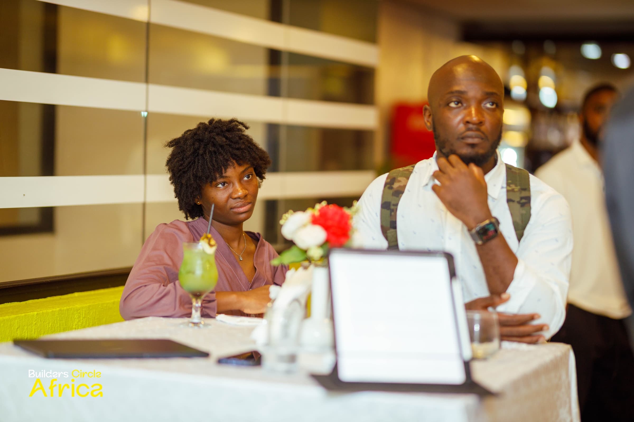 Guests listening to a talk