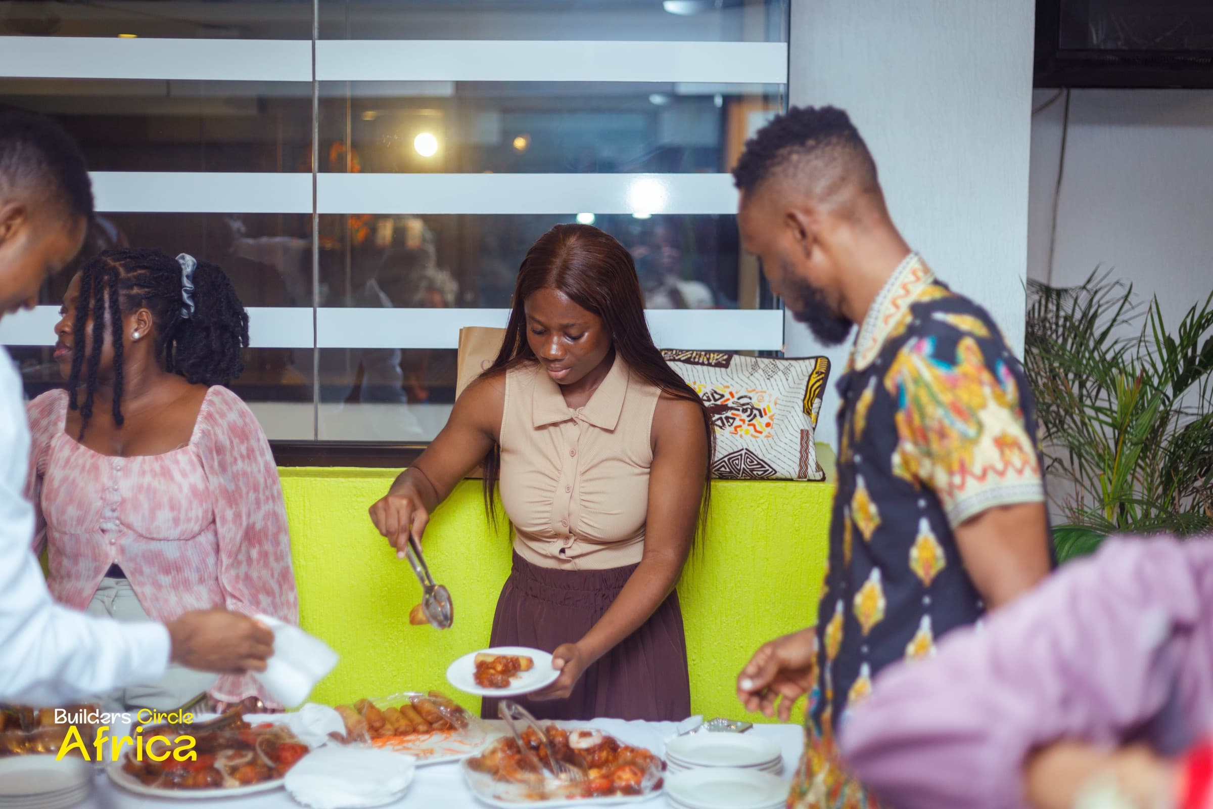Guests helping themselves at the buffet
