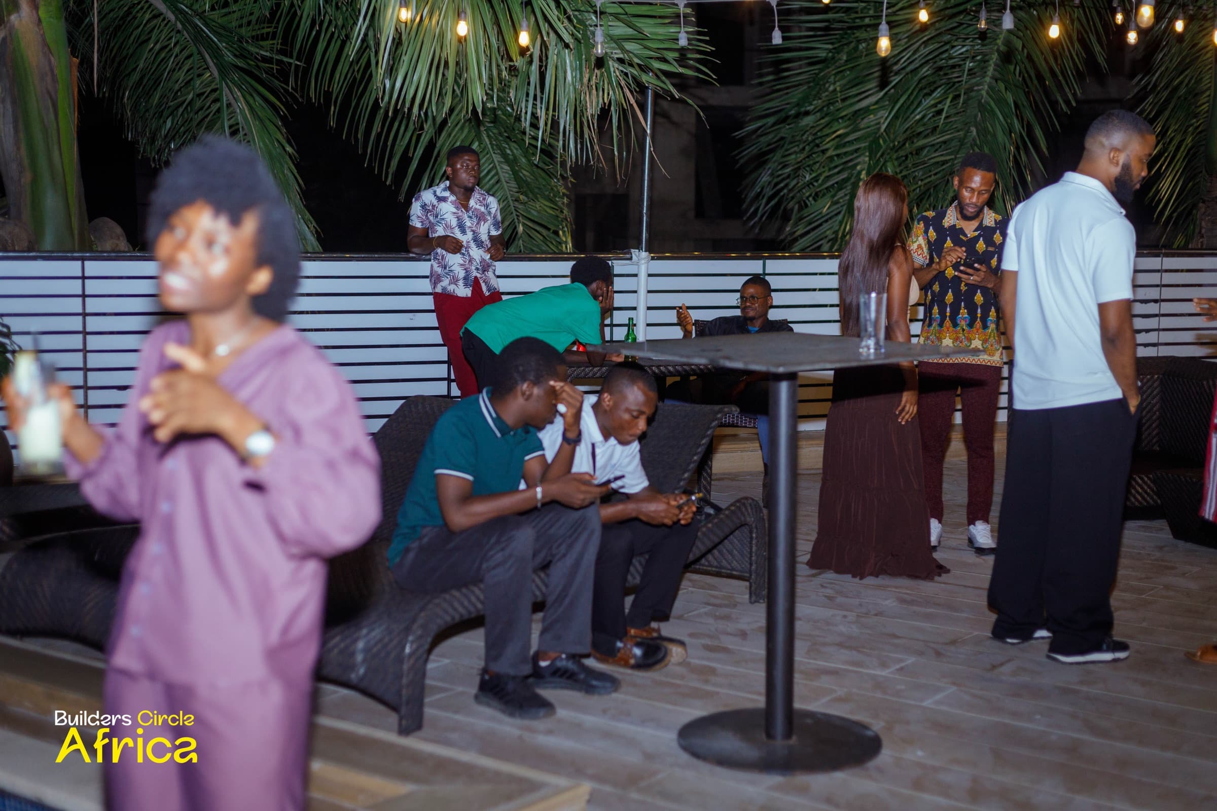 Guests relaxing poolside after the talks